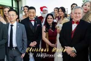 Samira Kazemeni of Samira's Network with Golden Christmas Extravaganza guests including Joey Zhou, Steve Ross and Santa Clause. 
